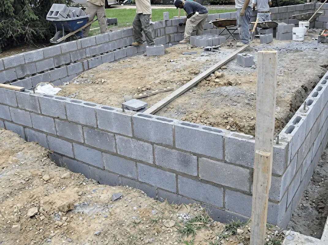 Professionals building a foundation with blocks in Rockford, IL